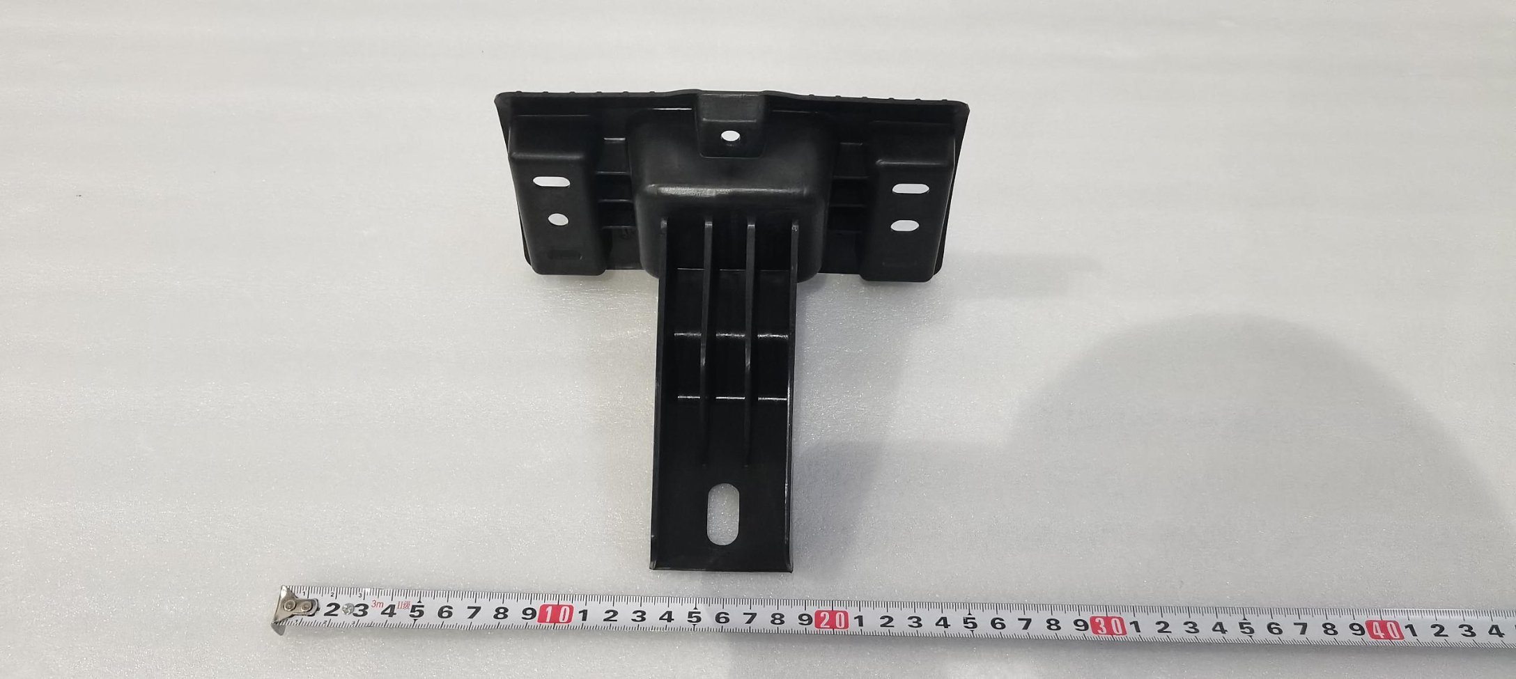 Front bumper upper mounting bracket ·